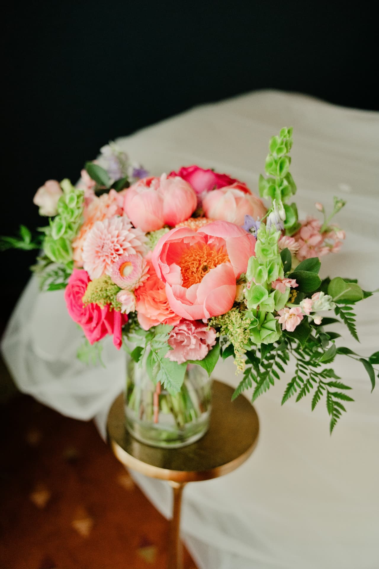 A bouquet resting in a glass vase