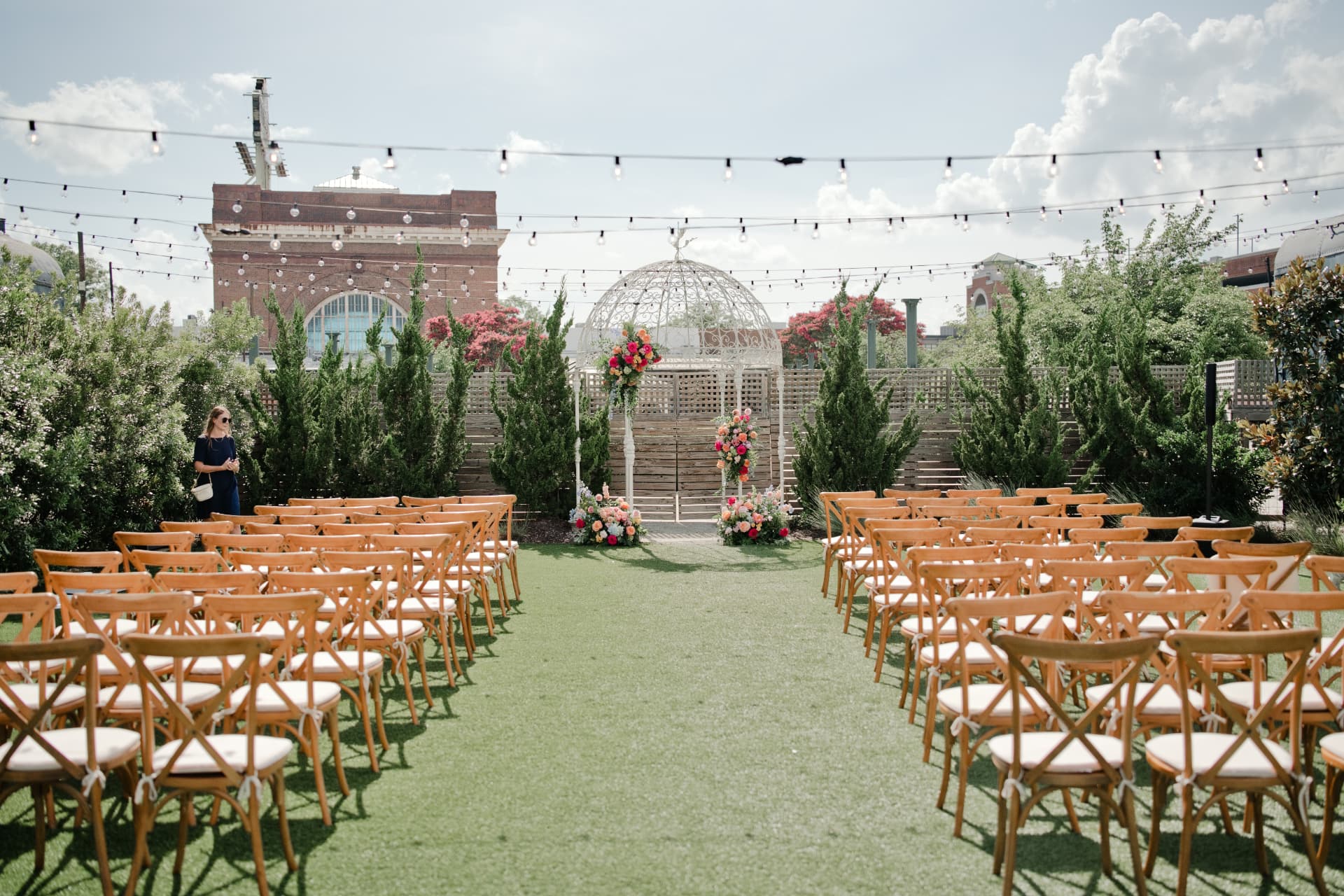 A ceremony setting framed by florals